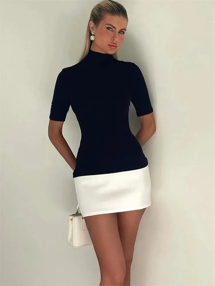 Vêtement femme: cette mini robe ajustée offre un look chic et tendance pour vos tenues d'automne.