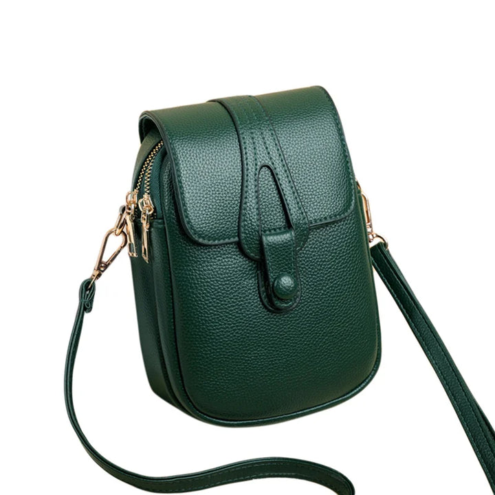 Sac bandoulière compact pour femme, porte-téléphone discret et stylé, cuir synthétique.