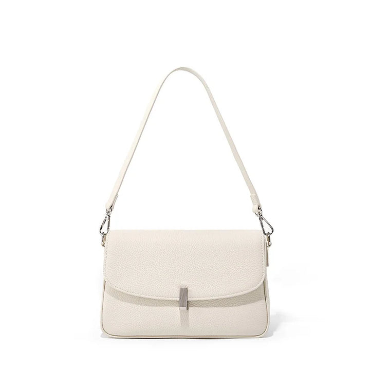 Mini sac bandoulière femme, en cuir texturé, parfait pour ranger l'essentiel avec style.