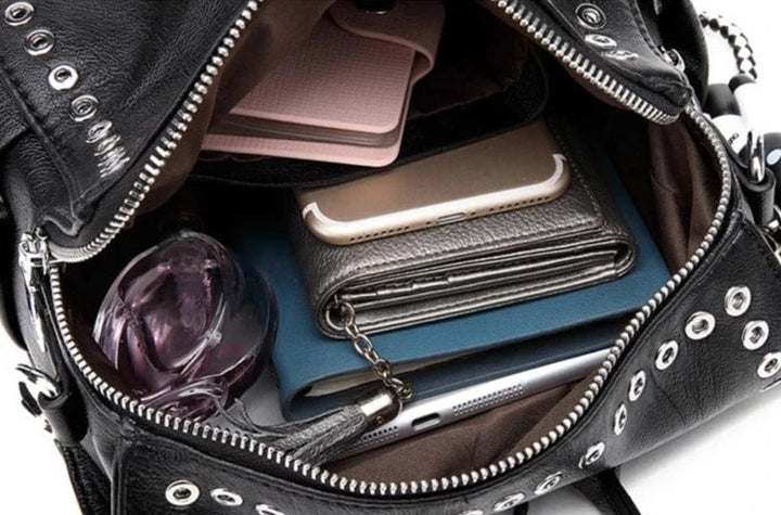 Mini sac à dos en cuir bleu marine pour femme, chic et compact
