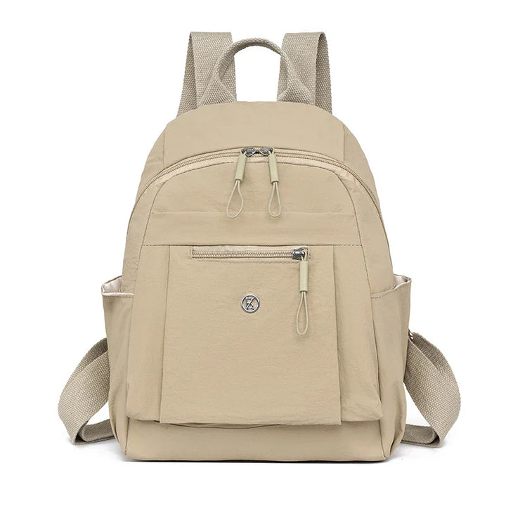 Mini sac à dos femme élégant en nylon, léger et pratique pour le quotidien.