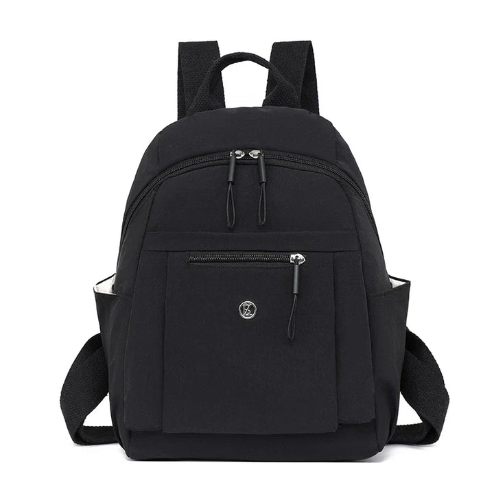 Élégant mini sac à dos femme en nylon léger, parfait pour le travail ou les loisirs.
