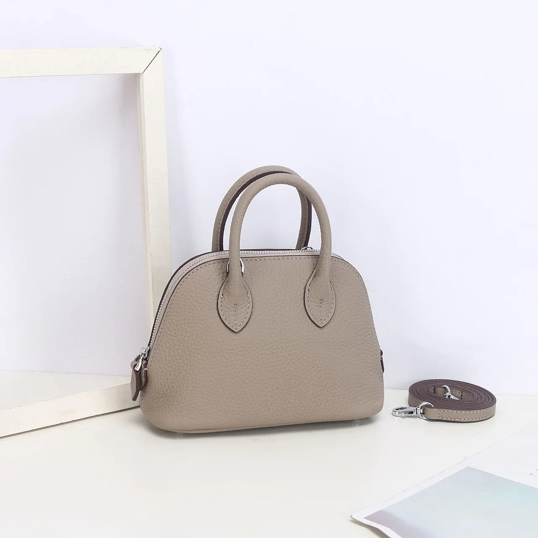 Mini sac à main bandoulière femme en cuir synthétique, chic et polyvalent, idéal pour le jour et la soirée.