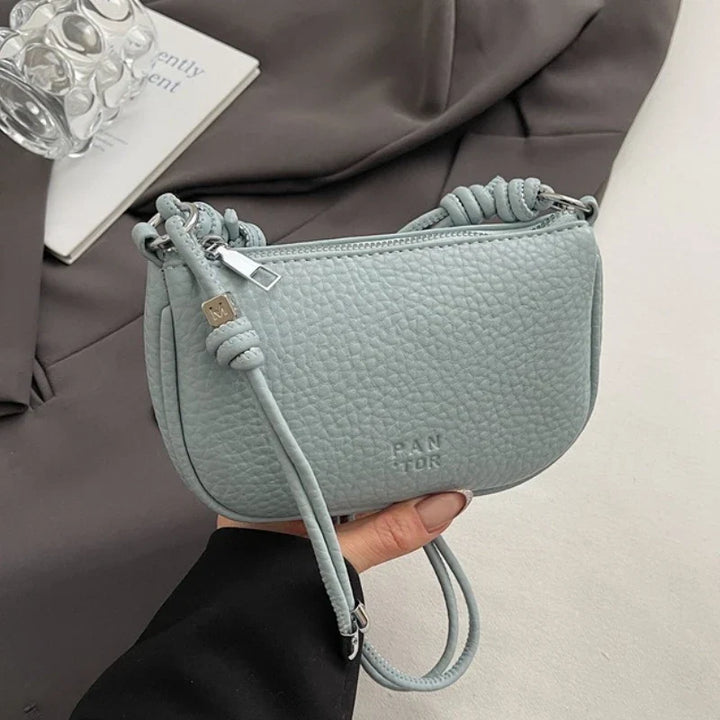 Petit sac à main chic pour femme, en similicuir de qualité, style élégant et compact, pour la mode.