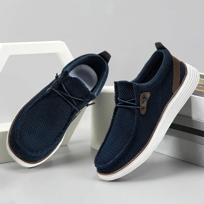 "Mocassins bateau homme élégants et confortables, tige respirante, design léger, couleur marine, style décontracté chic."