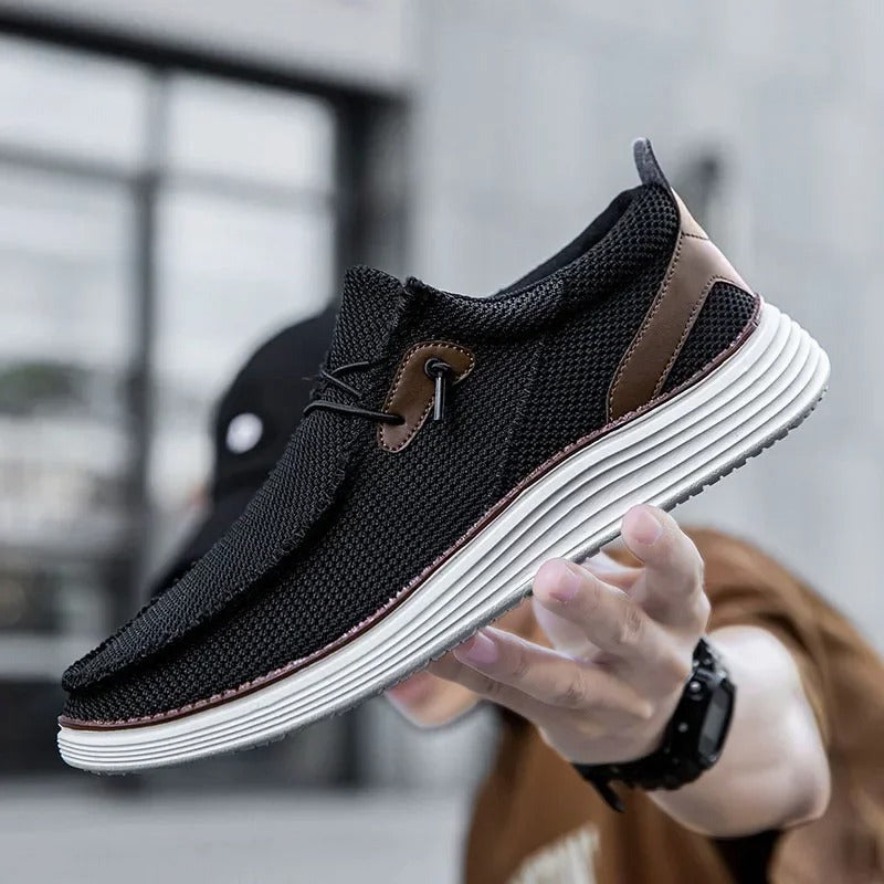 "Mocassins bateau homme élégants et confortables, tige respirante, design léger, couleur marine, style décontracté chic."