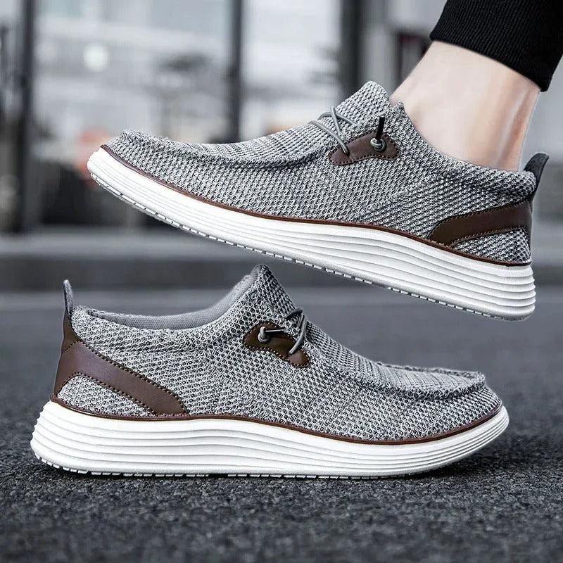 "Mocassins bateau homme élégants et confortables, tige respirante, design léger, couleur marine, style décontracté chic."