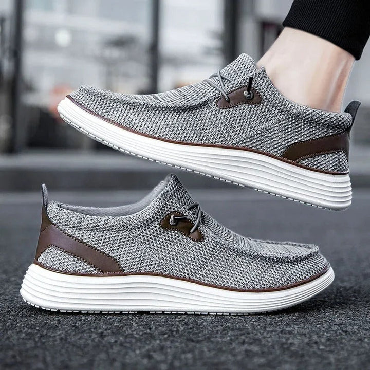 "Mocassins bateau homme élégants et confortables, tige respirante, design léger, couleur marine, style décontracté chic."