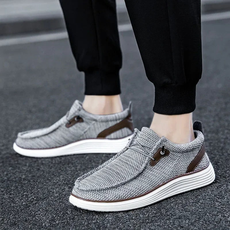 "Mocassins bateau homme élégants et confortables, tige respirante, design léger, couleur marine, style décontracté chic."