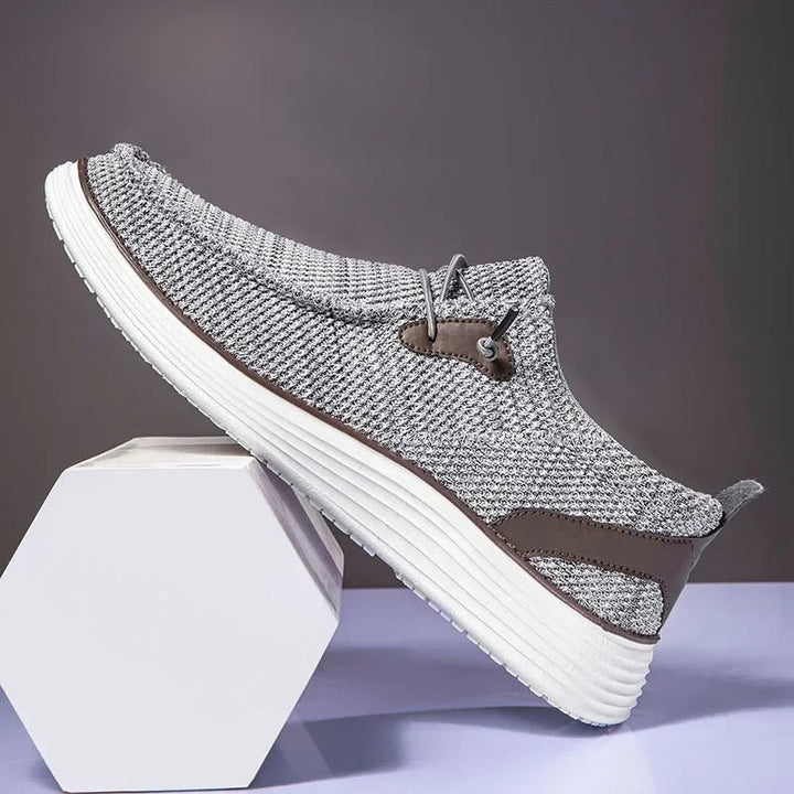 "Mocassins bateau homme élégants et confortables, tige respirante, design léger, couleur marine, style décontracté chic."