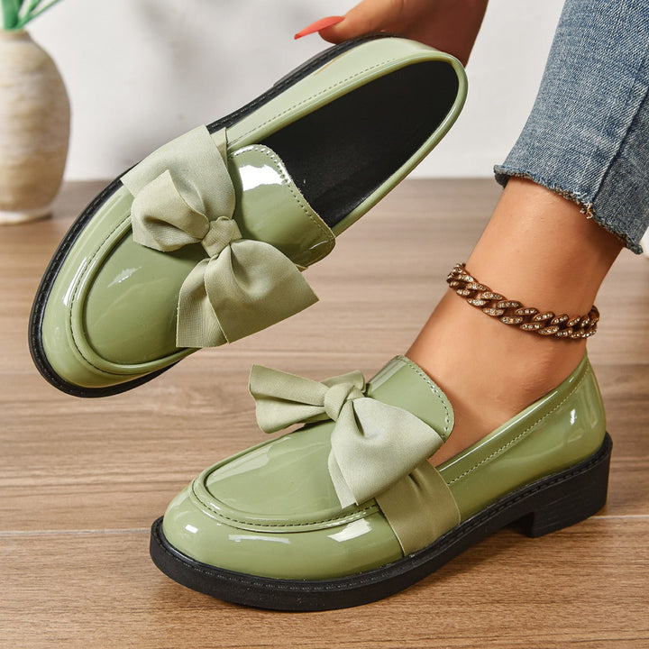 Chaussures mocassins femme confortables avec nœud, design élégant et polyvalent pour un usage quotidien.