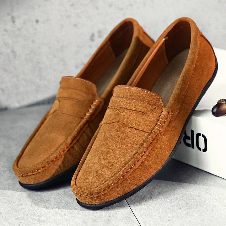 "Mocassins homme Le Dreux en daim suédé bleu marine, design élégant avec semelle confort et style raffiné à enfiler."
