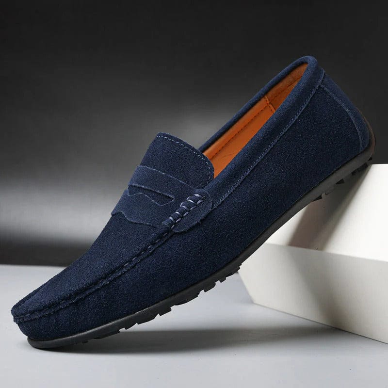 "Mocassins homme Le Dreux en daim suédé bleu marine, design élégant avec semelle confort et style raffiné à enfiler."