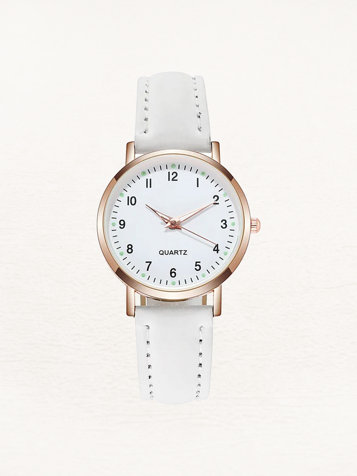 Montre femme élégante en cuir véritable, mouvement quartz, boîtier or rose. Accessoire mode et cadeau chic.