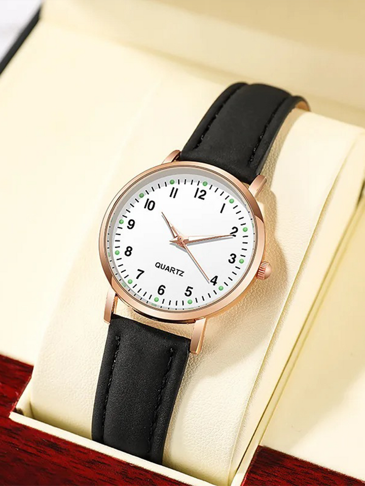 Montre bracelet femme en cuir et détails or rose. Un accessoire élégant, parfait pour sublimer chaque tenue.