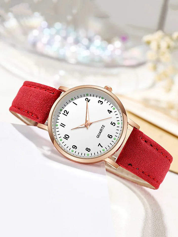 Montre élégante pour femme en cuir véritable et or rose. Accessoire de mode intemporel et chic.