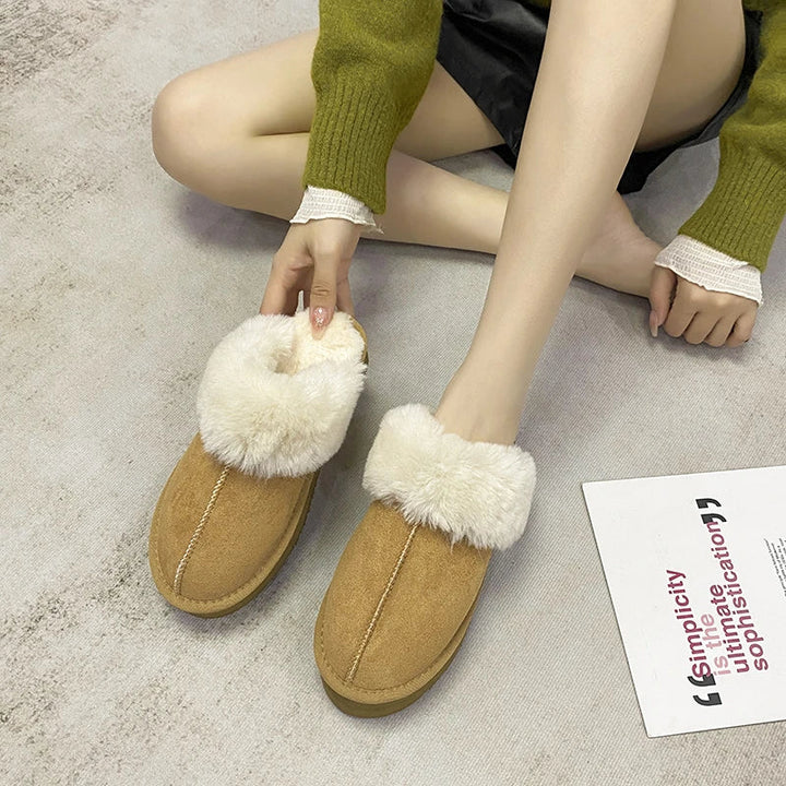 Mules en daim pour femmes, avec détail de fourrure, alliant confort et élégance pour les journées d'hiver.