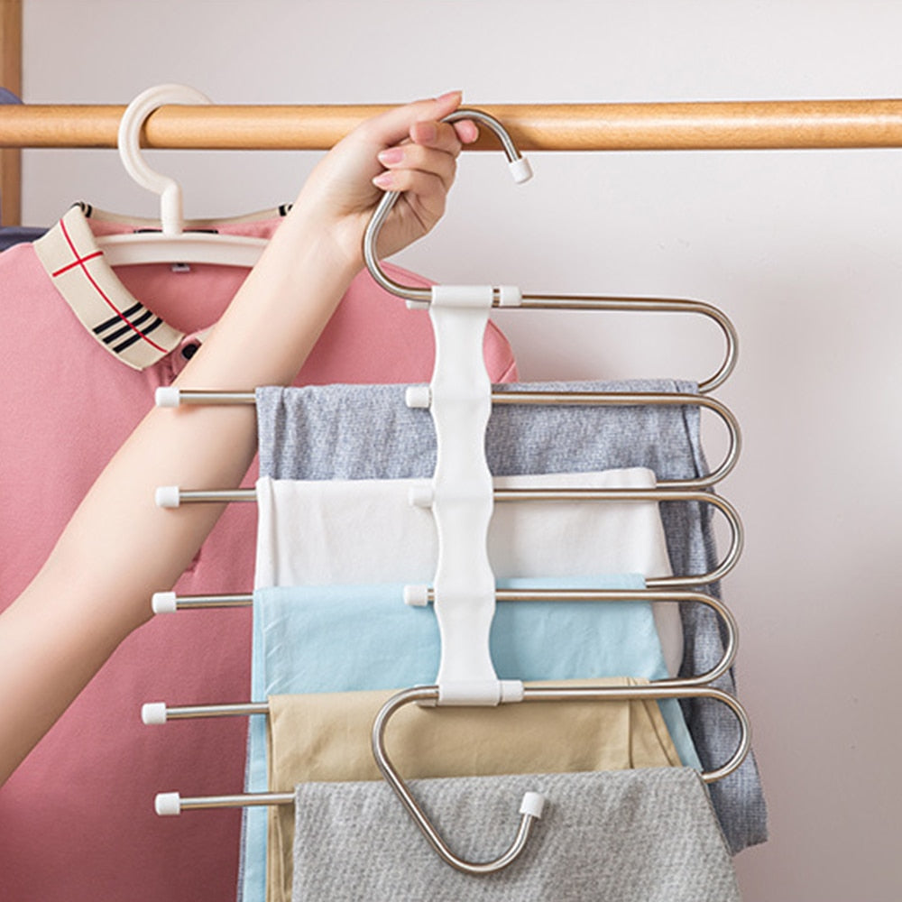 Multifunctional pants organizer for closet.  Space-saving design holds pants, skirts, and more.  Neatly organizes clothing.