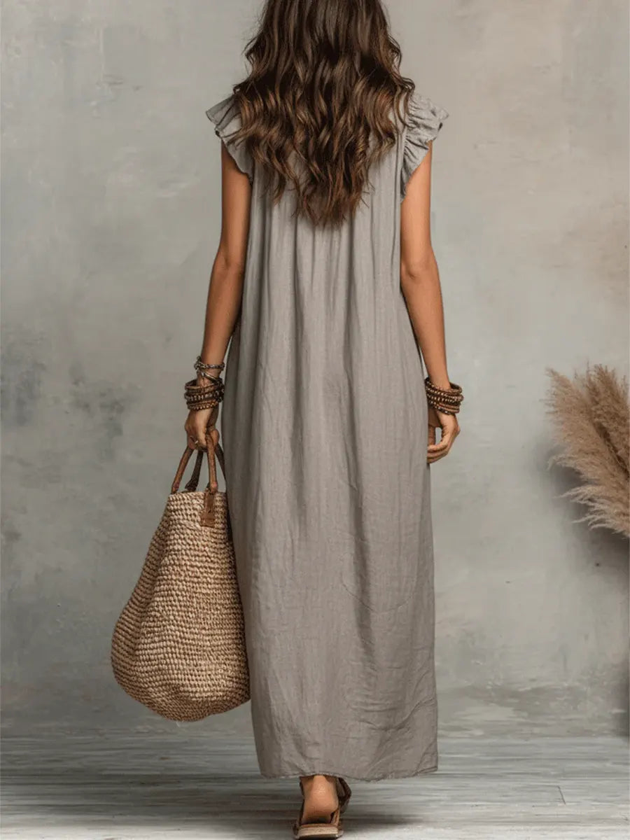 Élégante robe bohème femme lin coton, coupe fluide et naturelle, confortable occasions estivales.