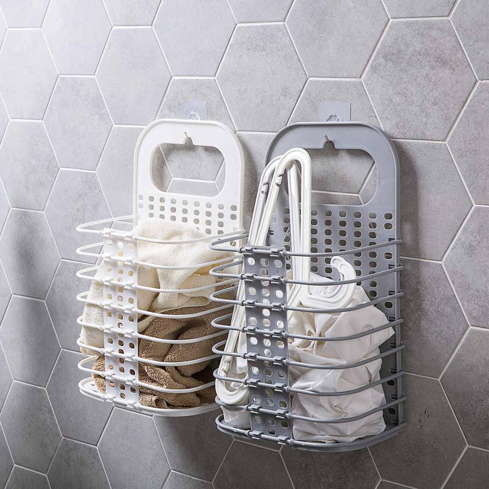 Panier à linge suspendu, gain de place.  Montage mural ou porte. Design élégant, salle de bain organisée.