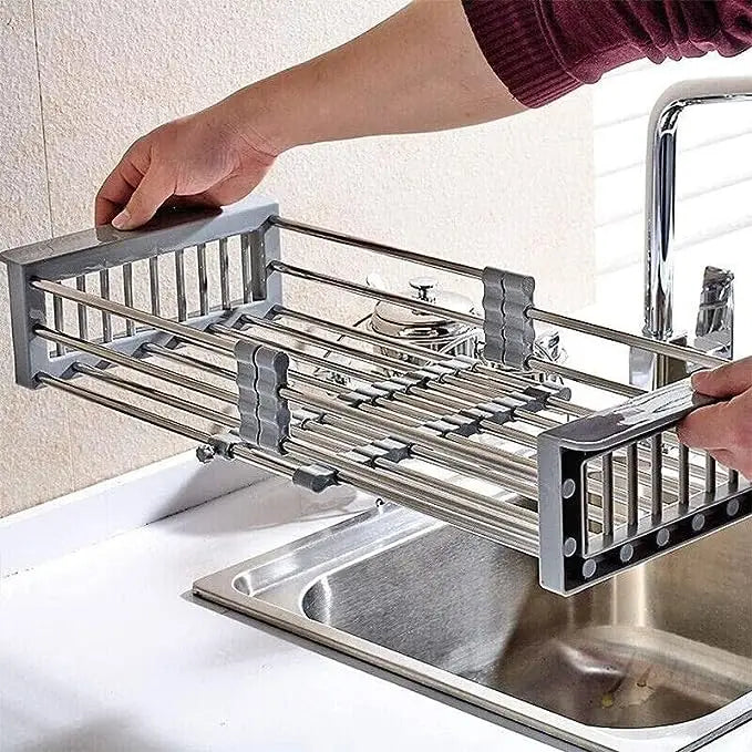 "Panier de vidange extensible en acier inox, multifonctionnel pour cuisine moderne, égouttoir ajustable et antidérapant."