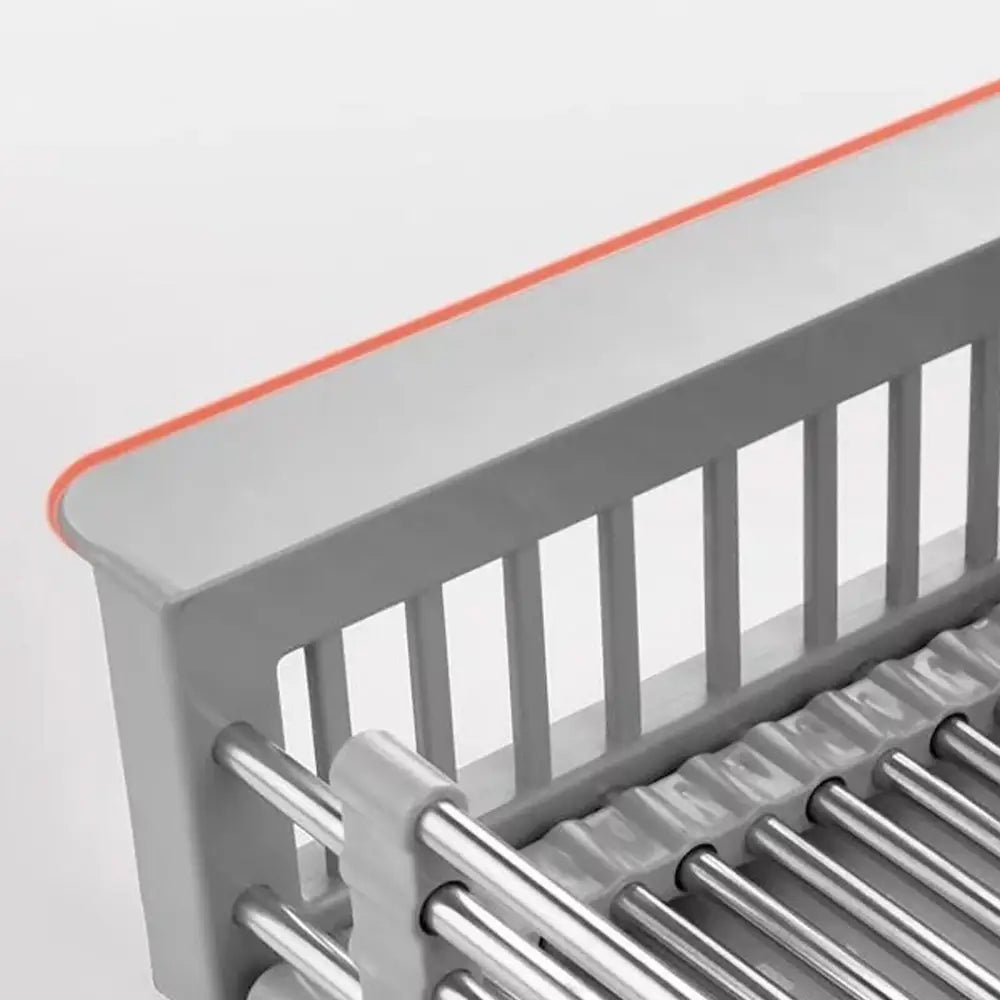 "Panier de vidange extensible en acier inox, multifonctionnel pour cuisine moderne, égouttoir ajustable et antidérapant."