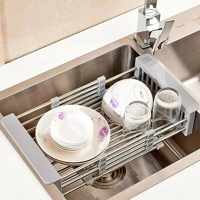 "Panier de vidange extensible en acier inox, multifonctionnel pour cuisine moderne, égouttoir ajustable et antidérapant."