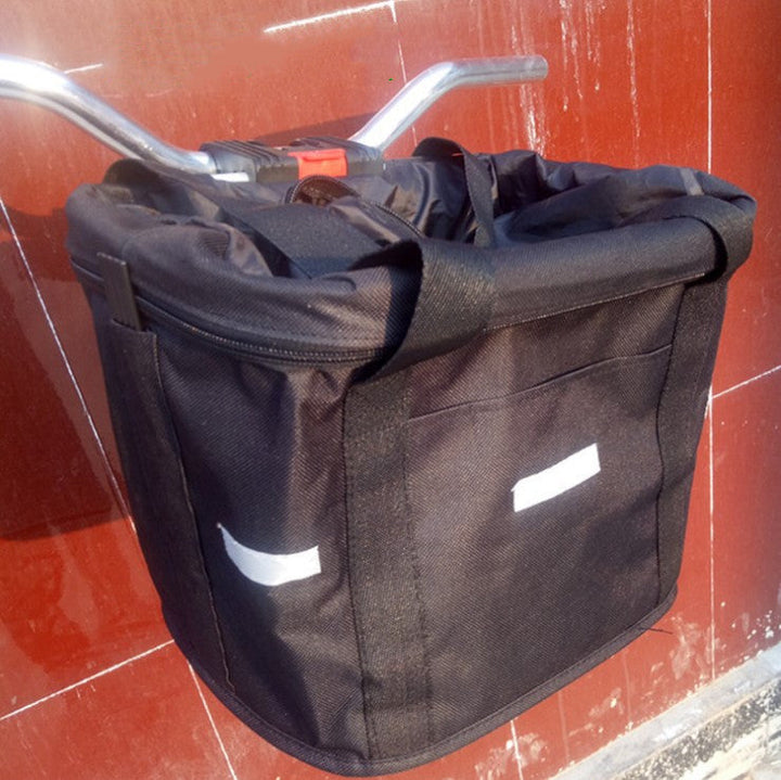 Panier vélo chien robuste, fixation renforcée, tissu Oxford. Sécurité et style pour balades canines.
