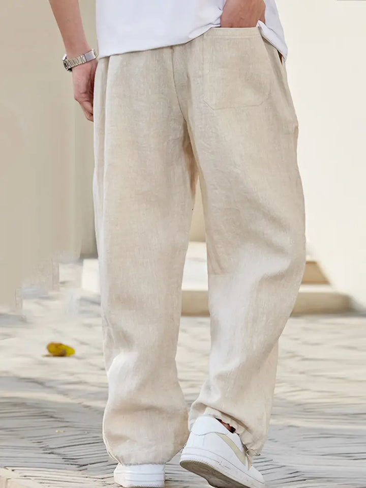 Pantalon en lin pour homme, couleur kaki, coupe ample offrant un confort maximal et respirant pour l'été.