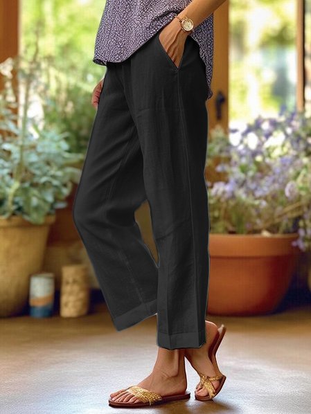 Pantalon large en lin pour femme, confortable et aéré, parfait pour les journées estivales.