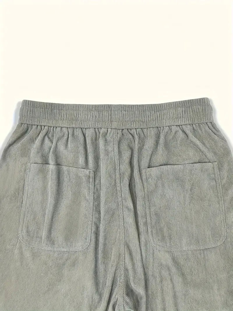 Pantalon ample homme gris, coupe décontractée, confort et style.