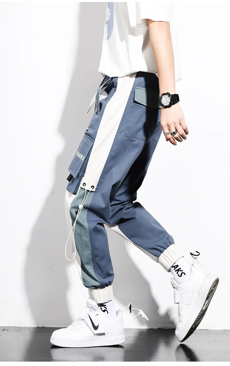 Pantalon cargo jogger bicolore homme, décontracté et confortable, idéal mode urbaine printemps-été.