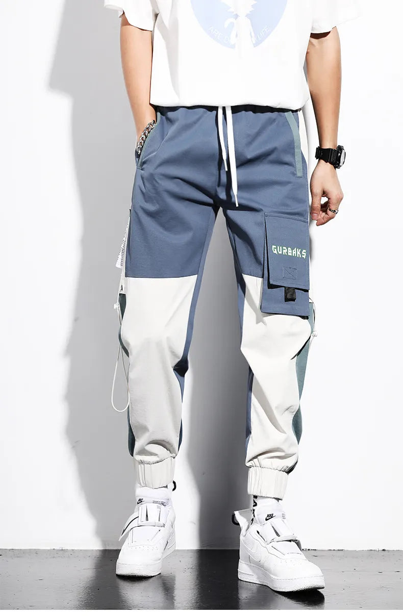 Pantalon cargo bicolore tendance pour hommes, avec poches fonctionnelles, parfait pour un look streetwear moderne.