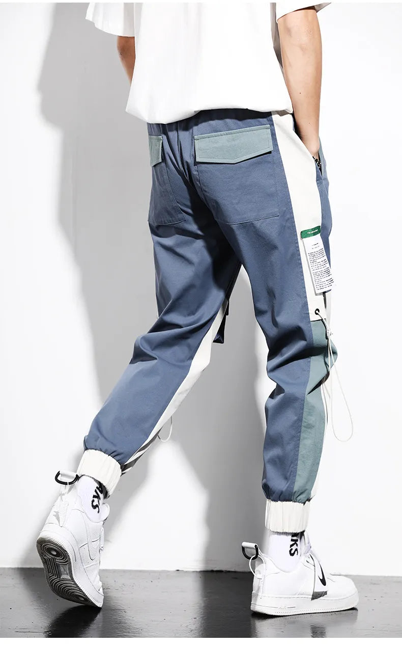 Pantalon cargo hommes bicolore, ultra confortable avec multiples poches, idéal pour un style urbain branché.
