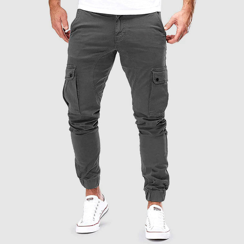 Pantalon cargo homme Alonso avec poches multiples, coupe ajustée, bord élastique pour confort urbain et style décontracté.
