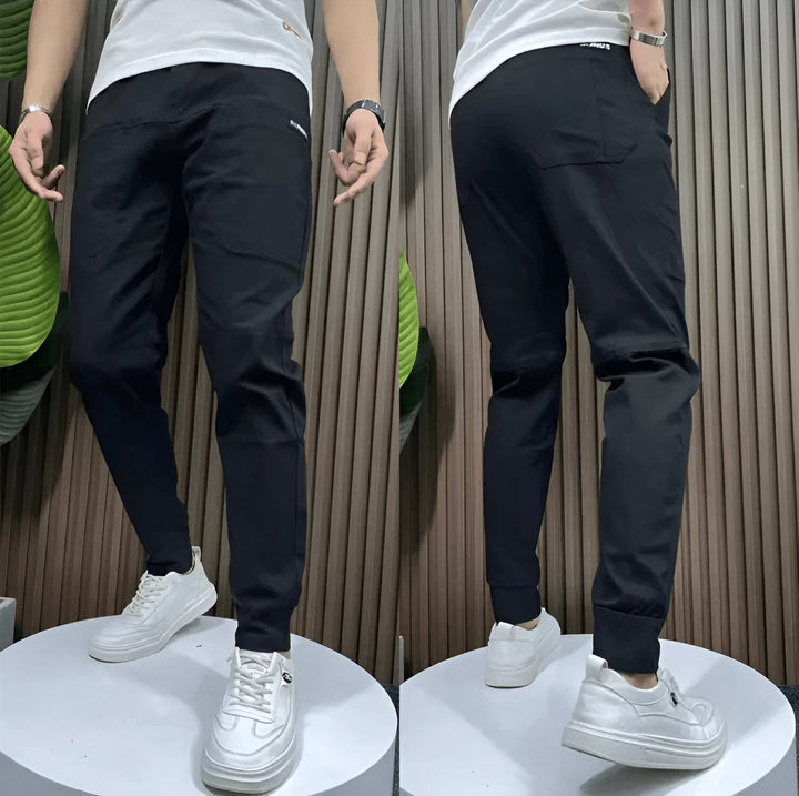 Pantalon cargo homme extensible, confortable et durable. Idéal pour le travail, l'extérieur et le quotidien. Multipoches.