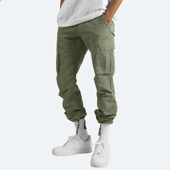 Pantalon cargo homme moderne, poches multiples, coupe élégante et confortable.