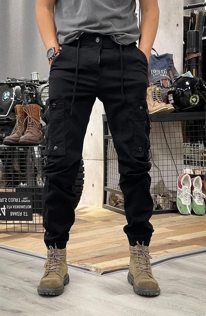 Pantalon cargo homme stretch, coupe moderne, poches multiples. Confort et style pour un look décontracté.