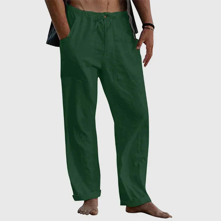 Taille élastique et cordon de serrage d'un pantalon homme en lin, offrant un confort réglable pour l'été décontracté.