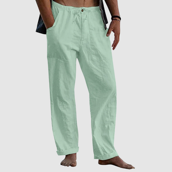Pantalon homme moderne en lin, style décontracté chic, avec cordon de serrage pour un été confortable et tendance.