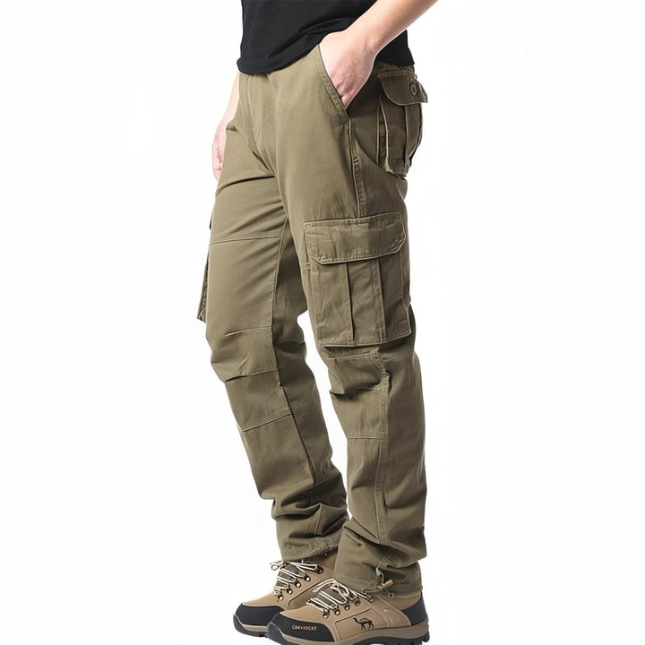 "Pantalon de randonnée respirant gris avec poches cargo et taille élastique, idéal pour trekking en plein air."