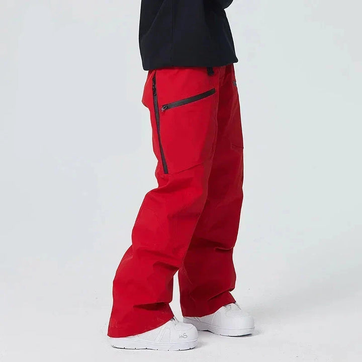 Pantalon de ski homme imperméable et chaud, idéal pour le snowboard et les sports d'hiver sur neige.