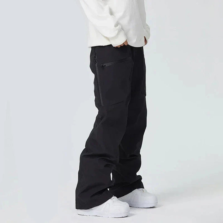 Pantalon homme pour sports d'hiver: protection optimale, imperméable et coupe-vent pour ski et snowboard.