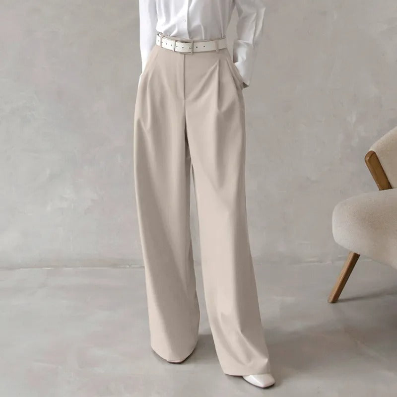 Pantalon de tailleur chic pour femme. Taille haute structurée, jambe large pour style décontracté ou habillé.