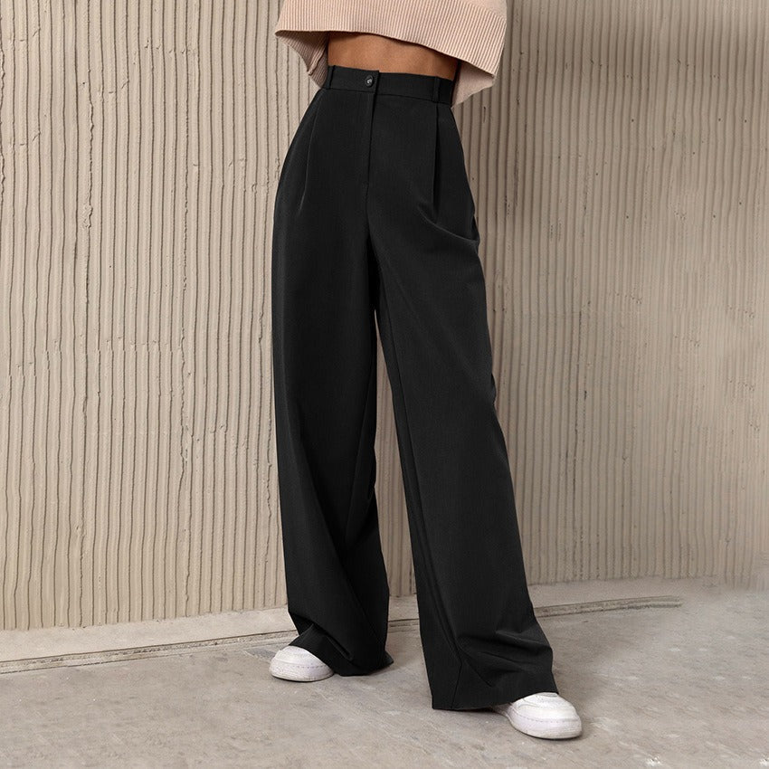 Pantalon femme élégant avec taille haute, jambe large, parfait pour le bureau ou une tenue de soirée chic.