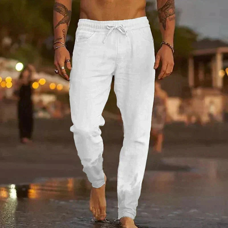 "Pantalon décontracté homme, lin respirant, coupe moderne, couleur blanche, idéal pour l'été et les occasions casual."