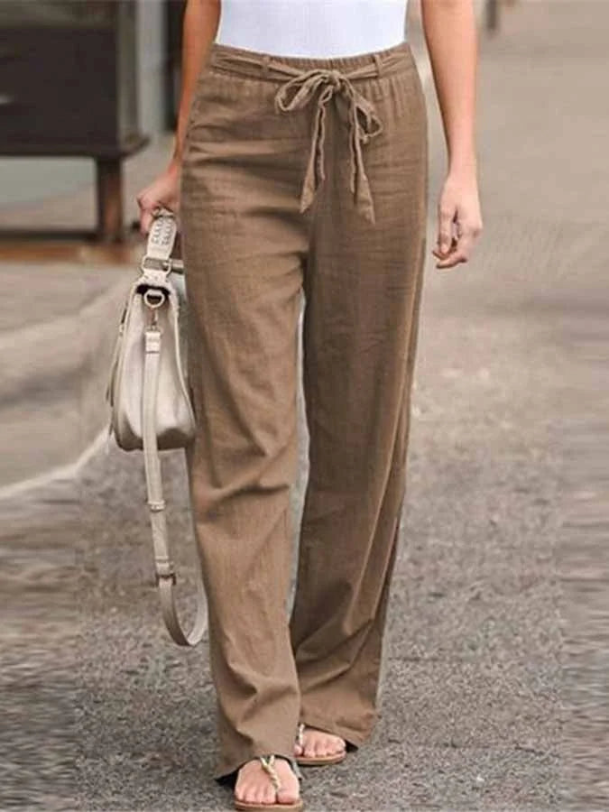 "Pantalon d'été femme en lin, taille haute, coupe ample, léger et respirant pour élégance estivale."