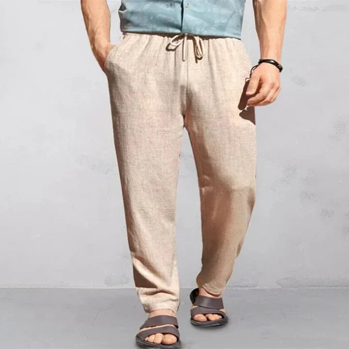 "Pantalon d'été homme lin, léger et respirant, coupe décontractée, idéal journées chaudes, look simple et élégant."