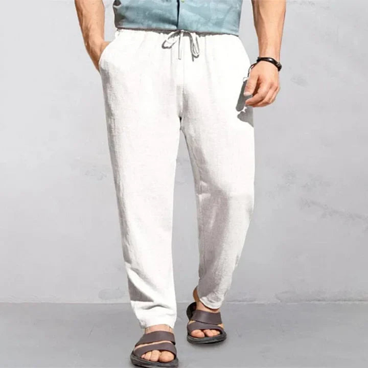 "Pantalon d'été homme lin, léger et respirant, coupe décontractée, idéal journées chaudes, look simple et élégant."