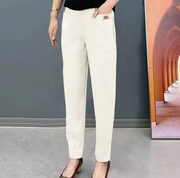 "Pantalon en coton pour femmes, élégant et confortable, avec détails élastiques et disponible en plusieurs couleurs."